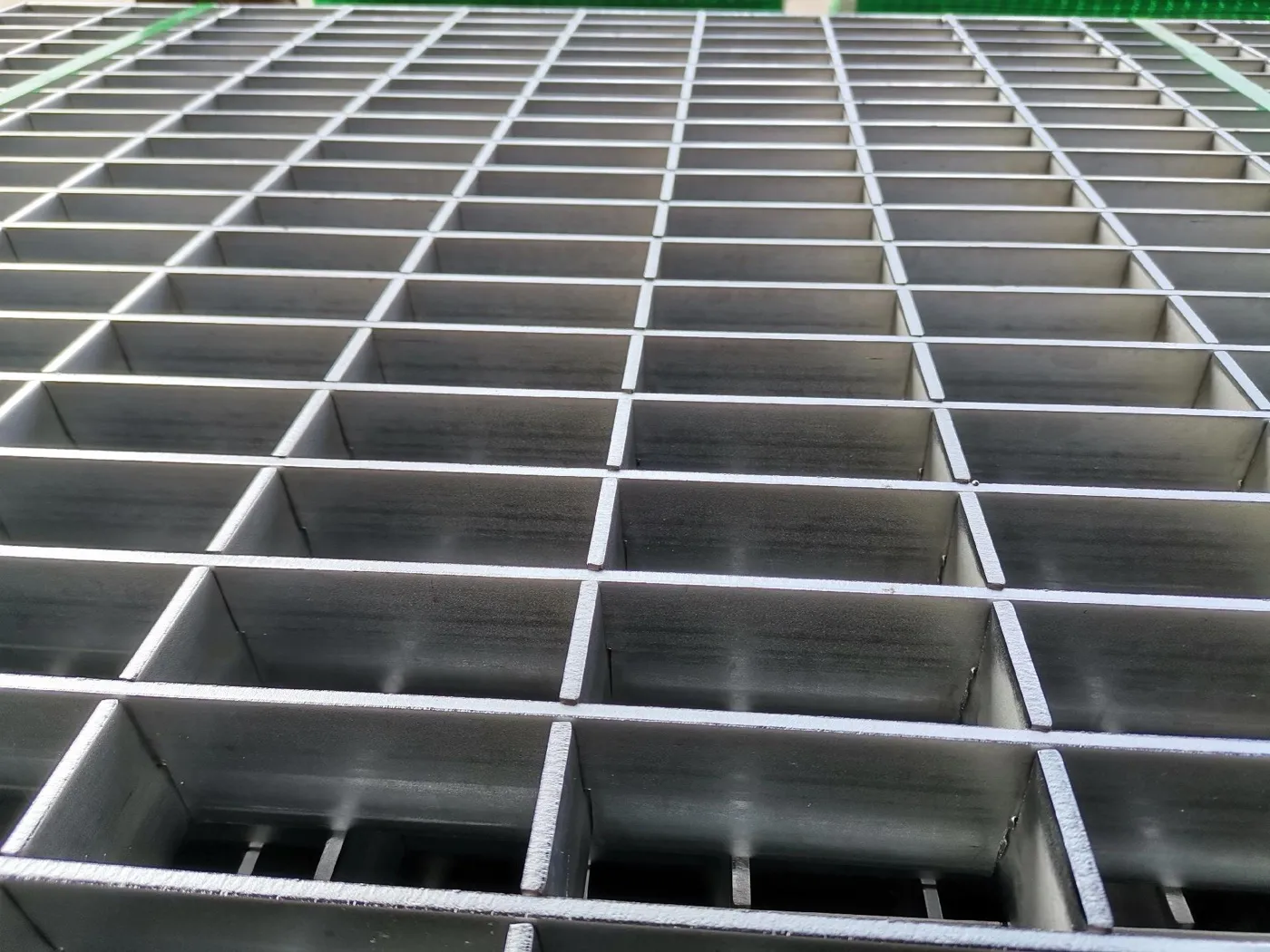 Fabricated stainless steel grating panel detail