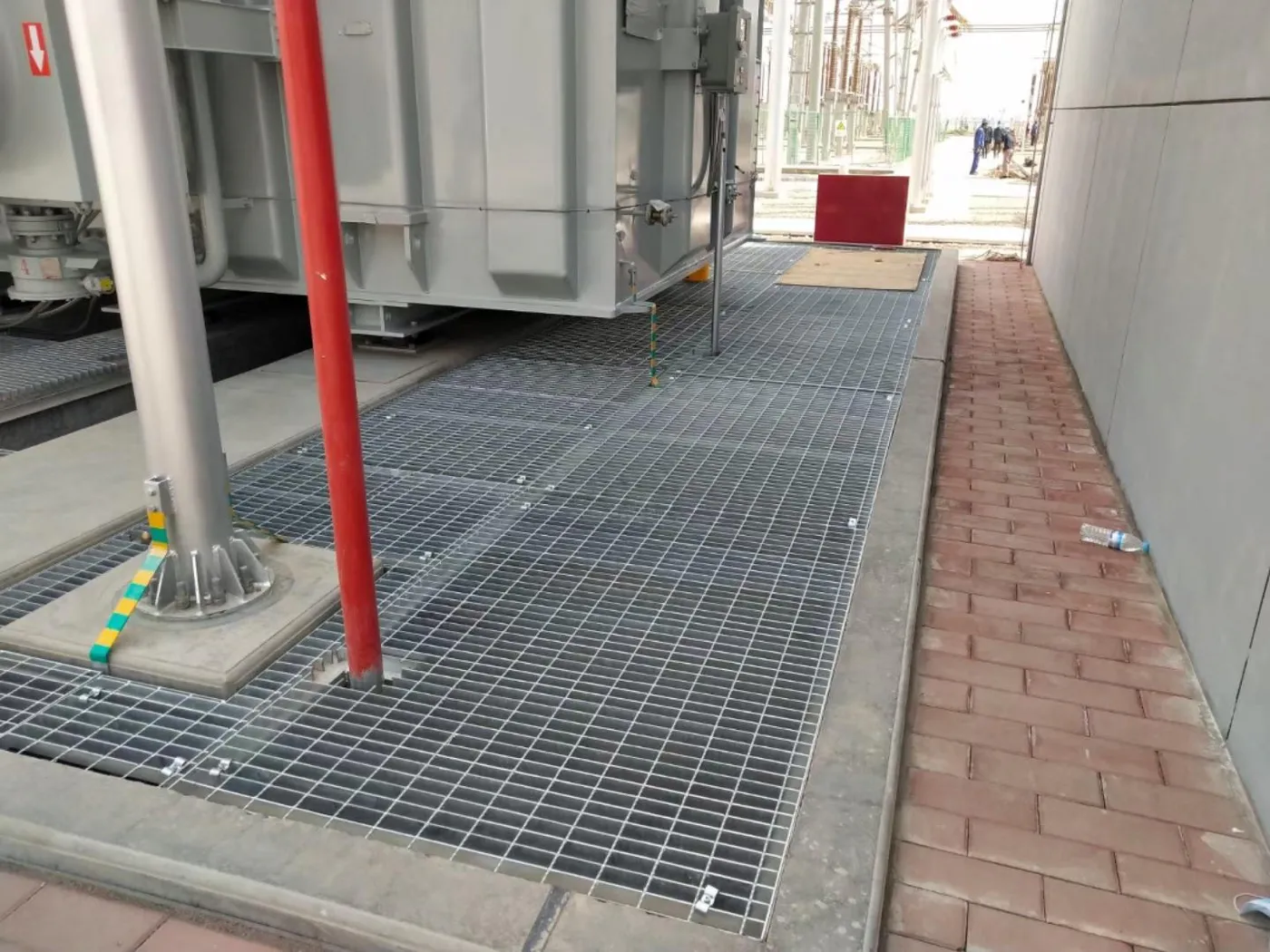 Steel grating flooring around electrical substation equipment