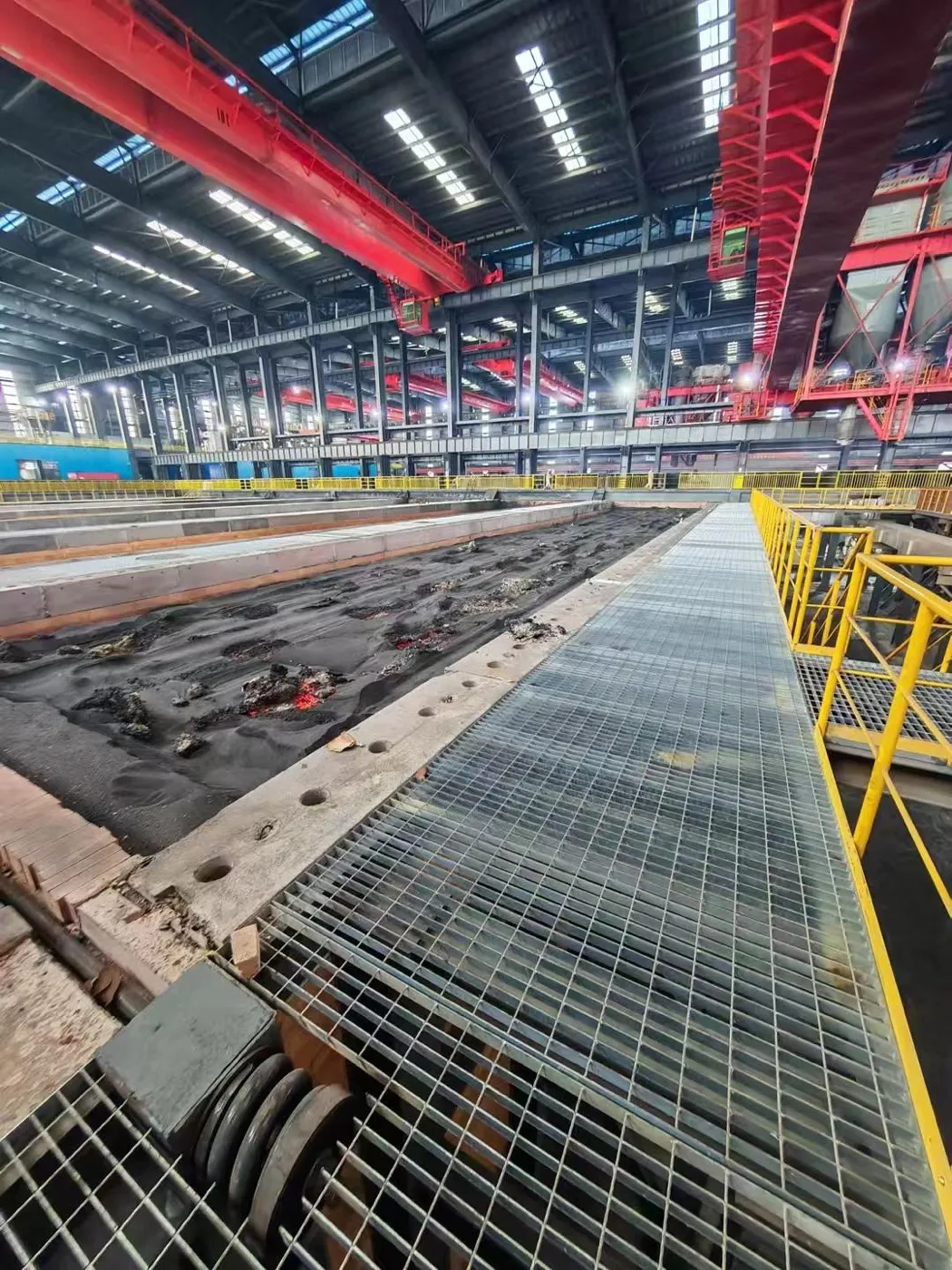 Steel grating maintenance platform inside a production plant