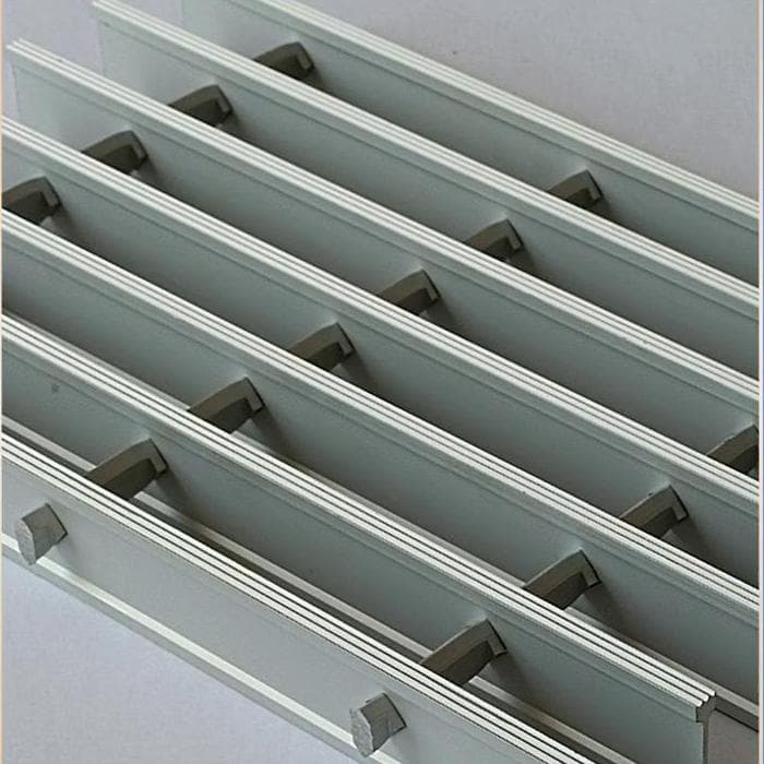Close view between aluminum I-bars and their cross-bar connections