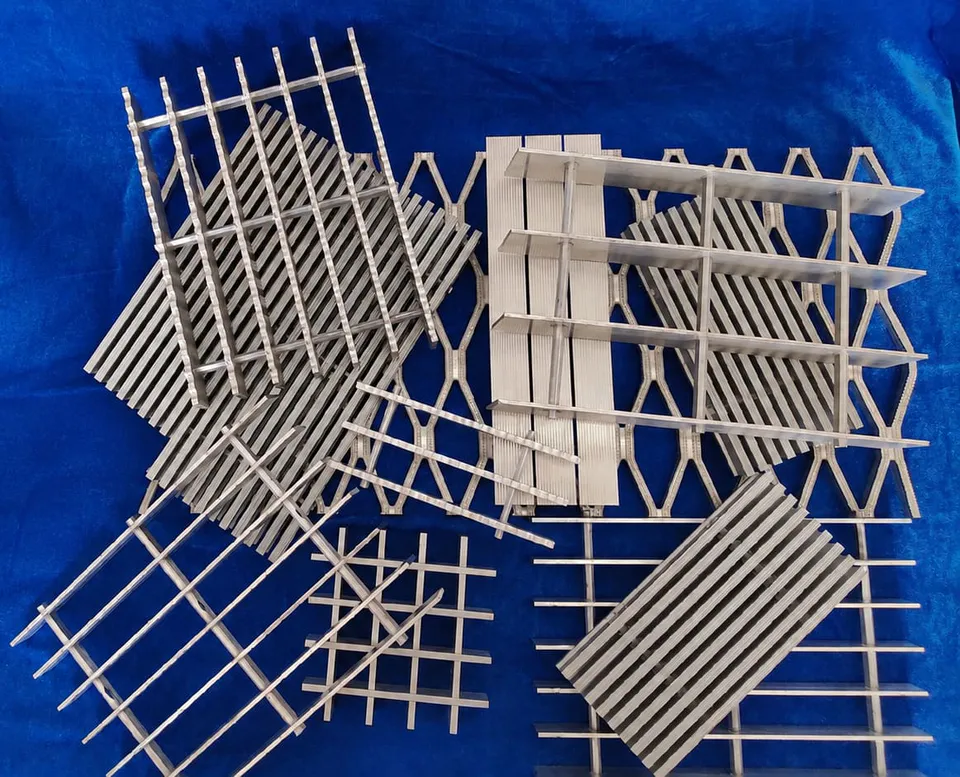 Assorted aluminum grating constructions and profile samples
