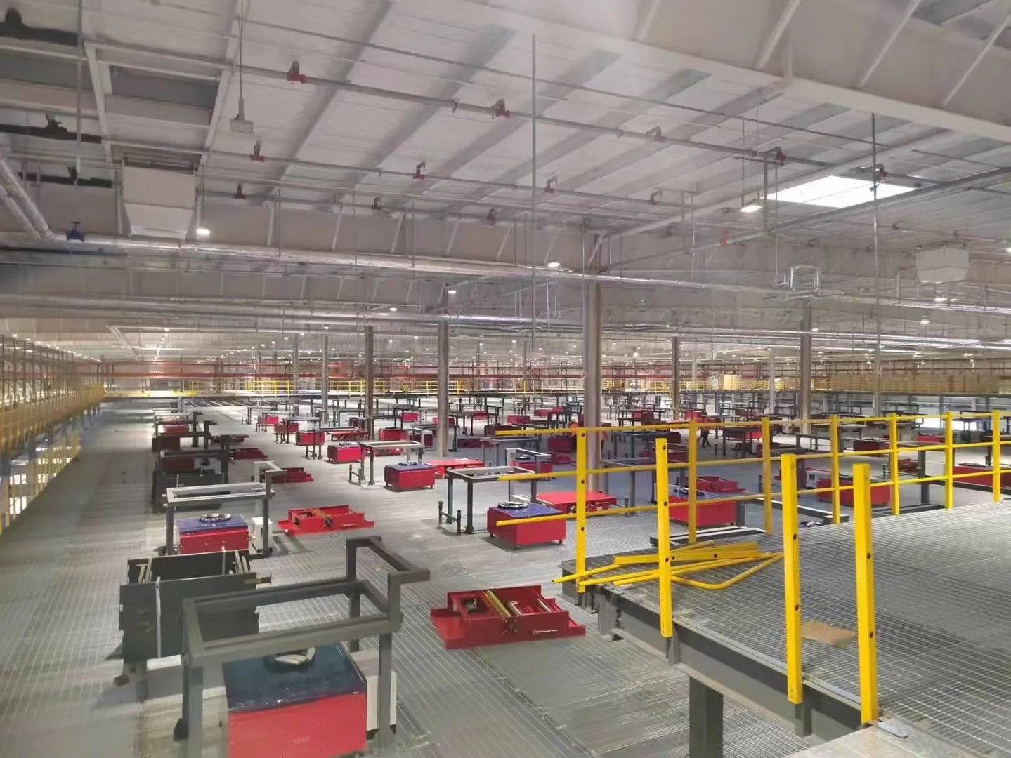 Automated sorting equipment integrated with a large steel grating operating platform