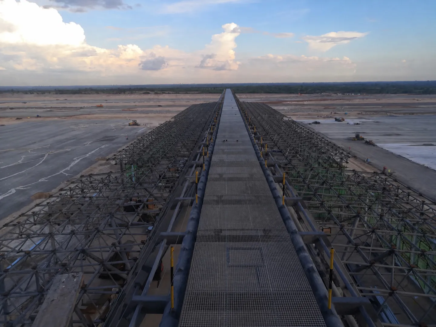 Elevated airport passage maintenance platform extending across the service area in Cambodia
